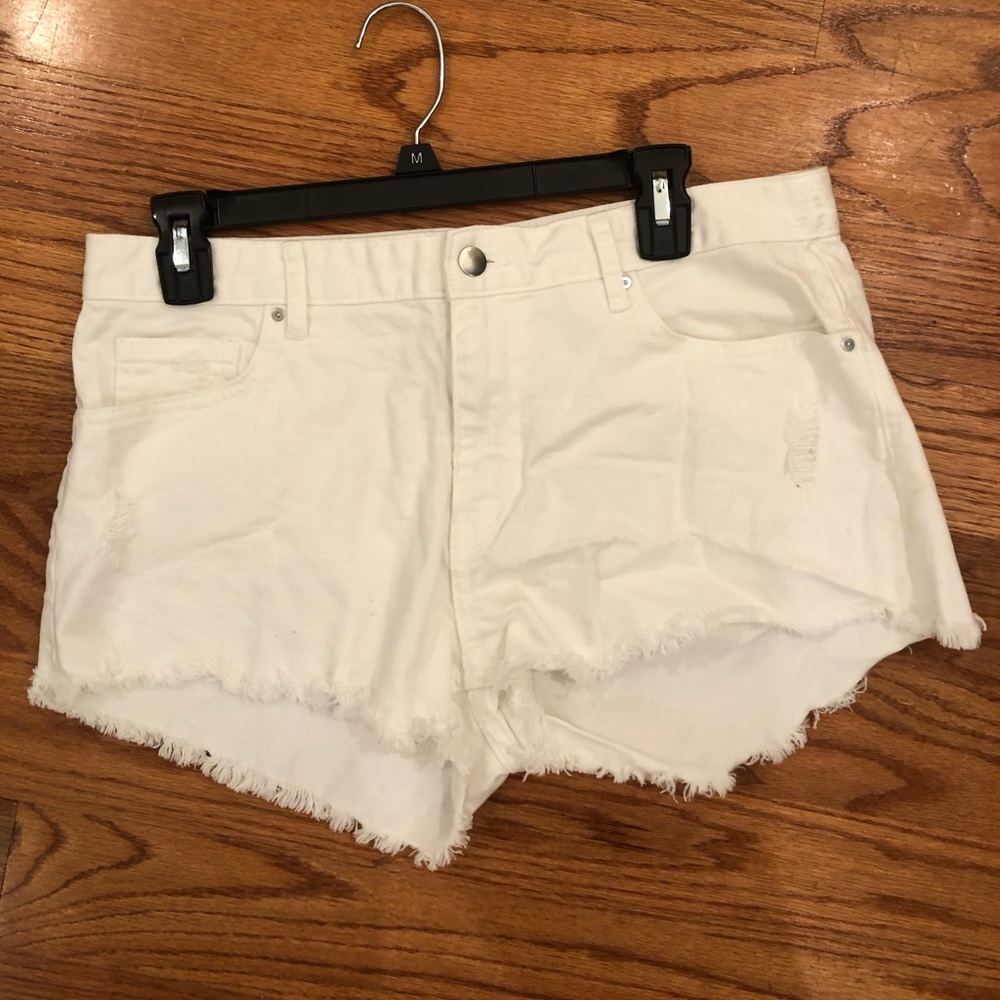White Jean Shorts with Rips